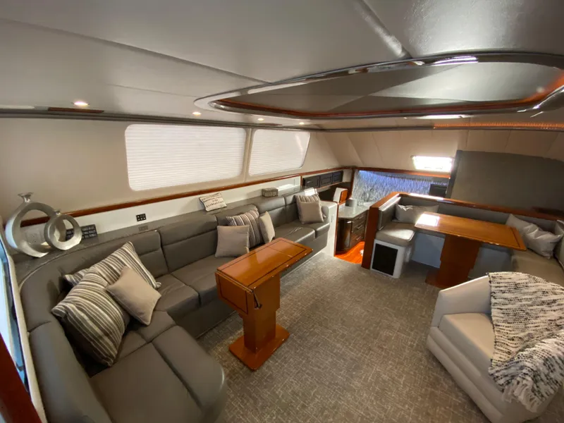 Slide: The Image of Luxurious interior of 1995 Mares 58 Power Cat with modern seating and elegant decor. - 31