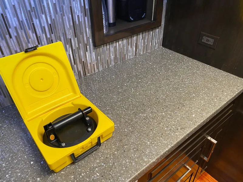 Slide: The Image of Yellow case on countertop in Mares 58 Power Cat, 1995 model. - 45
