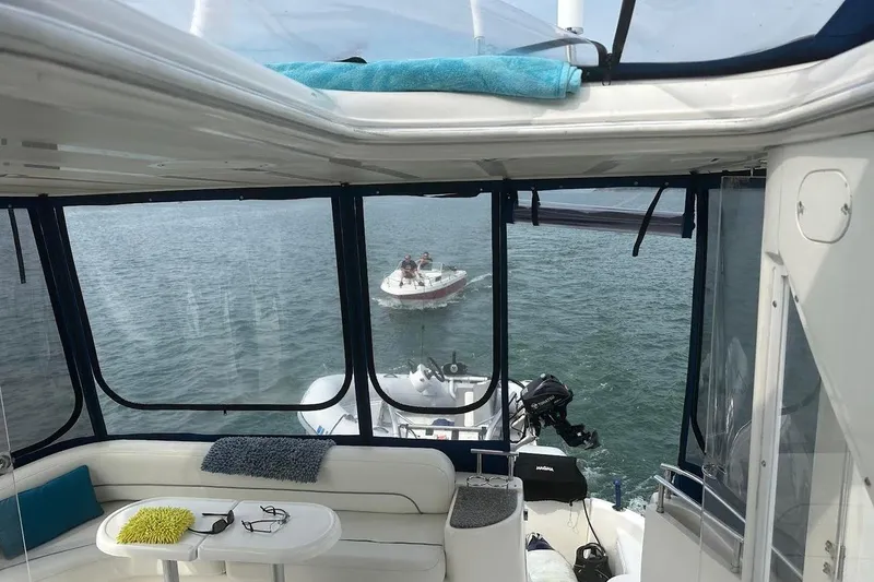 Slide: The Image of Interior view of 2004 Meridian 459 Motoryacht with ocean backdrop. - 11