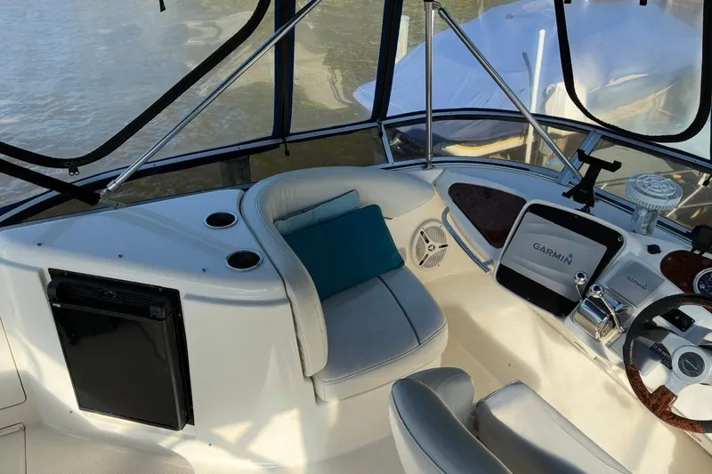 Slide: The Image of Cockpit of 2004 Meridian 459 Motoryacht with Garmin navigation system and comfortable seating. - 13