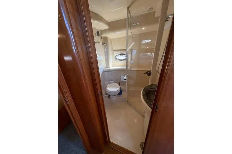 Slide: The Image of Bathroom interior of 2004 Meridian 459 Motoryacht with shower and toilet. - 23