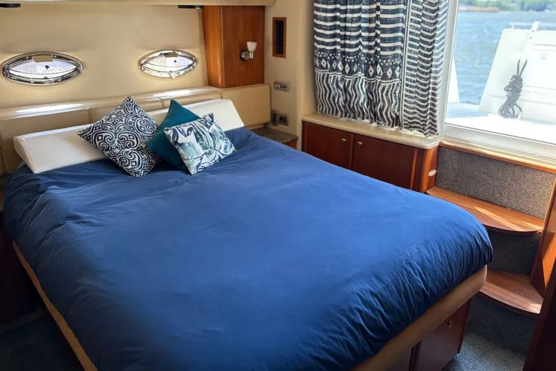 Slide: The Image of Inflatable dinghy on 2004 Meridian 459 Motoryacht, docked at marina. - 7