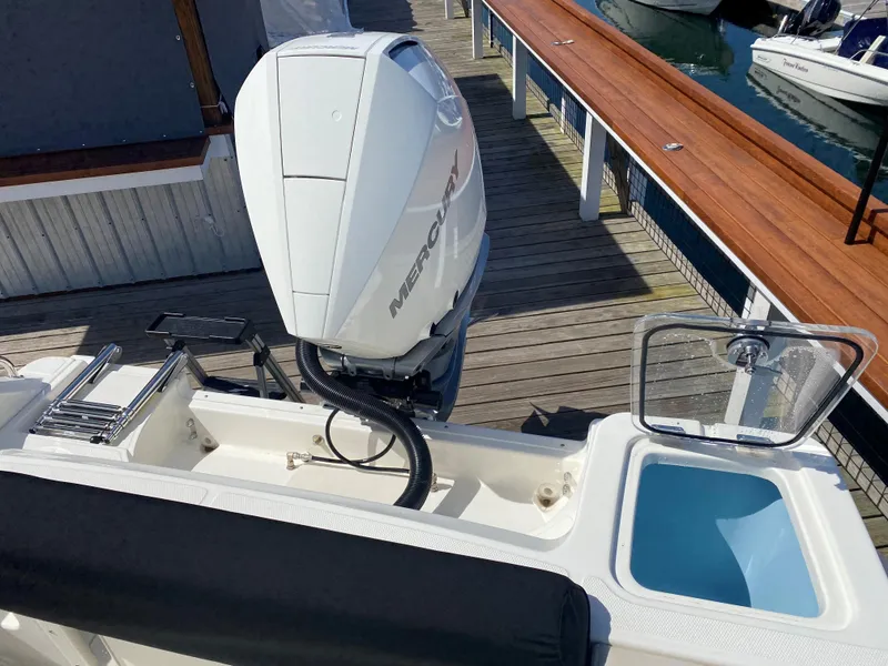 Slide: The Image of Boston Whaler 230 Outrage 2022 with Mercury engine at dock. - 10