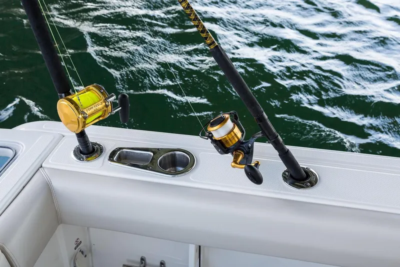 Slide: The Image of Fishing rod holders on a 2022 Boston Whaler 230 Outrage boat. - 27