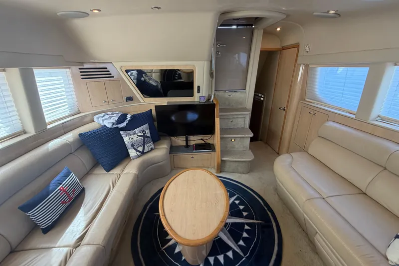 Slide: The Image of Luxurious interior of 2002 Sea Ray 480 Motor Yacht with plush seating and modern amenities. - 17