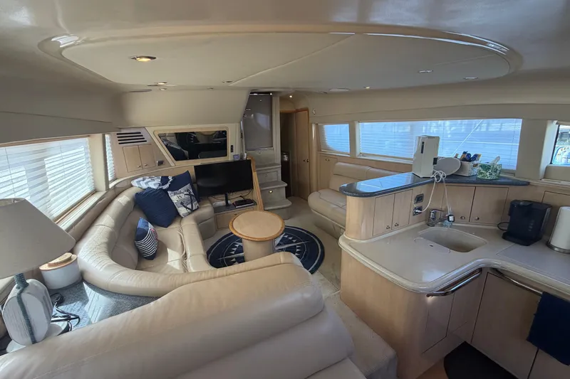 Slide: The Image of Luxurious interior of 2002 Sea Ray 480 Motor Yacht with plush seating and modern amenities. - 18
