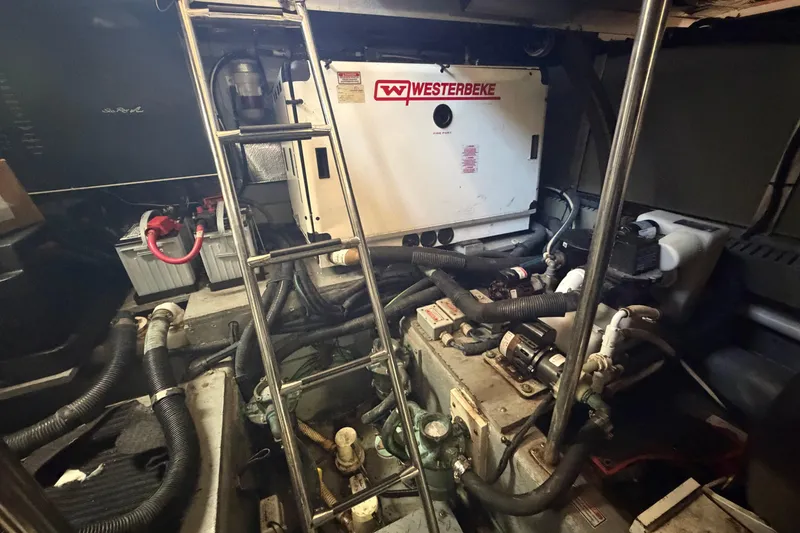 Slide: The Image of Engine room of 2002 Sea Ray 480 Motor Yacht with Westerbeke generator. - 37