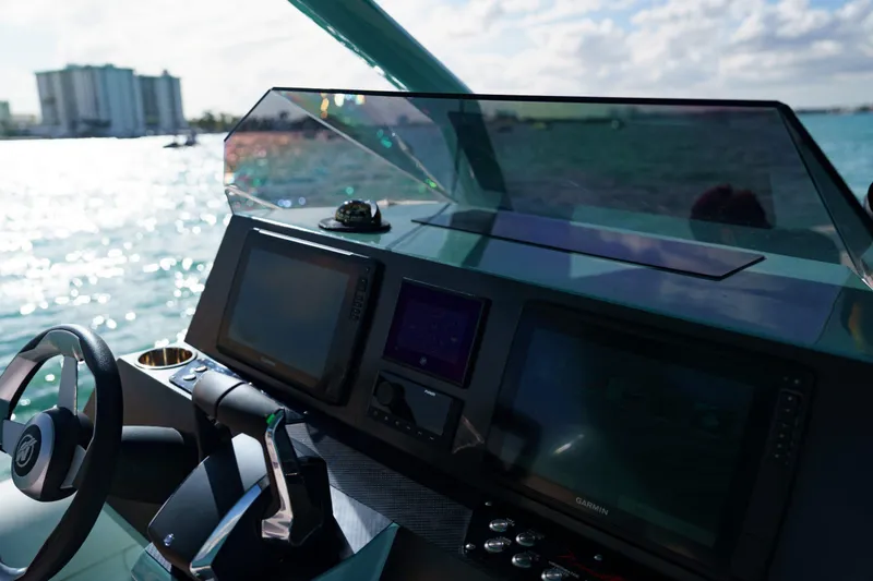 Slide: The Image of Cockpit of 2025 Novielli Veloche boat with modern navigation screens and steering wheel. - 19