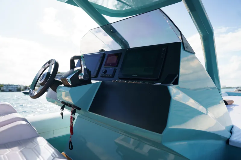 Slide: The Image of Cockpit of 2025 Novielli Veloche boat with modern steering and navigation system. - 8