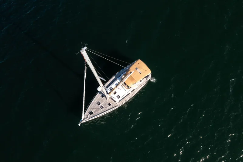 Slide: The Image of Aerial view of 2011 Dufour 525 Grand Large sailing on open water. - 10