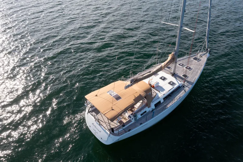 Slide: The Image of Aerial view of 2011 Dufour 525 Grand Large sailboat on open water. - 16
