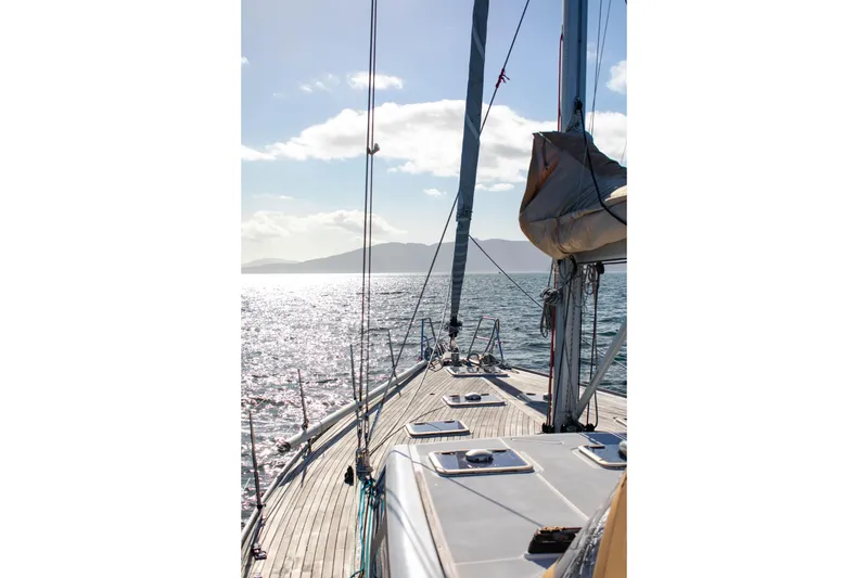 Slide: The Image of Sailing on a 2011 Dufour 525 Grand Large yacht, sunlit sea view. - 20