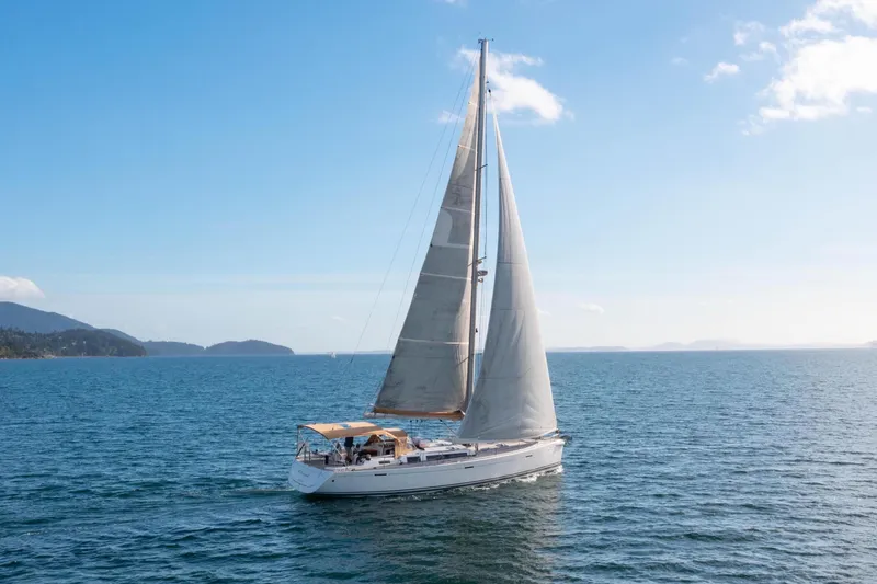 Slide: The Image of Dufour 525 Grand Large 2011 sailboat on open sea. - 5