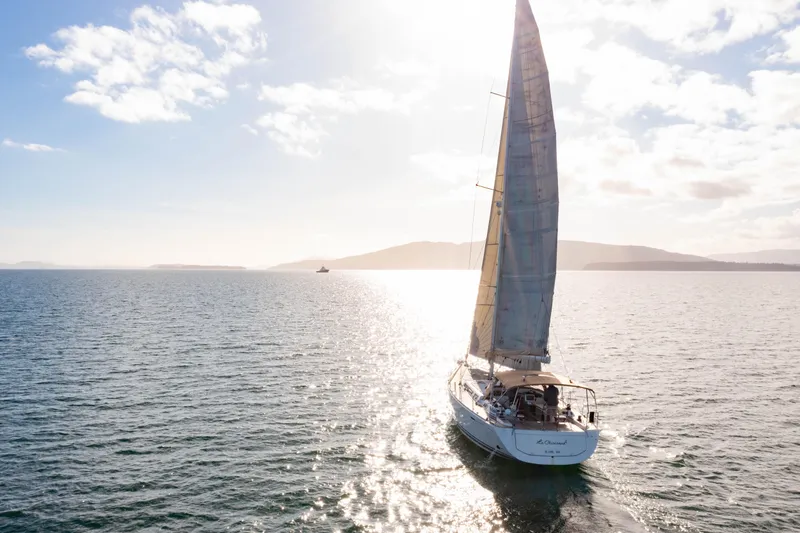 Slide: The Image of Sailing yacht Dufour 525 Grand Large 2011 on open sea under sunny sky. - 6