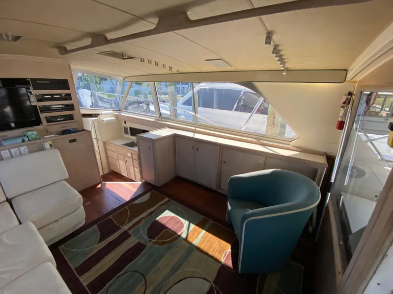 Slide: The Image of Interior of 1982 Bertram 46.6 War Wagon yacht with modern seating and cabinetry. - 20