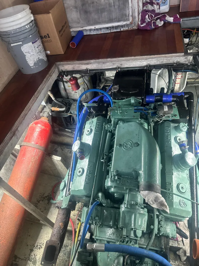 Slide: The Image of Engine room of 1982 Bertram 46.6 War Wagon with visible machinery and equipment. - 41