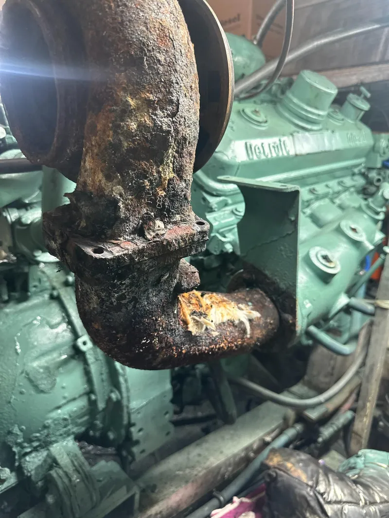 Slide: The Image of Rusty engine component of a 1982 Bertram 46.6 War Wagon boat. - 46