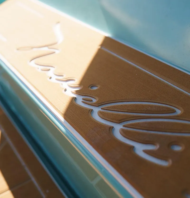 Slide: The Image of Close-up of Novielli Veloche 349 logo on wooden surface, 2026 model. - 19