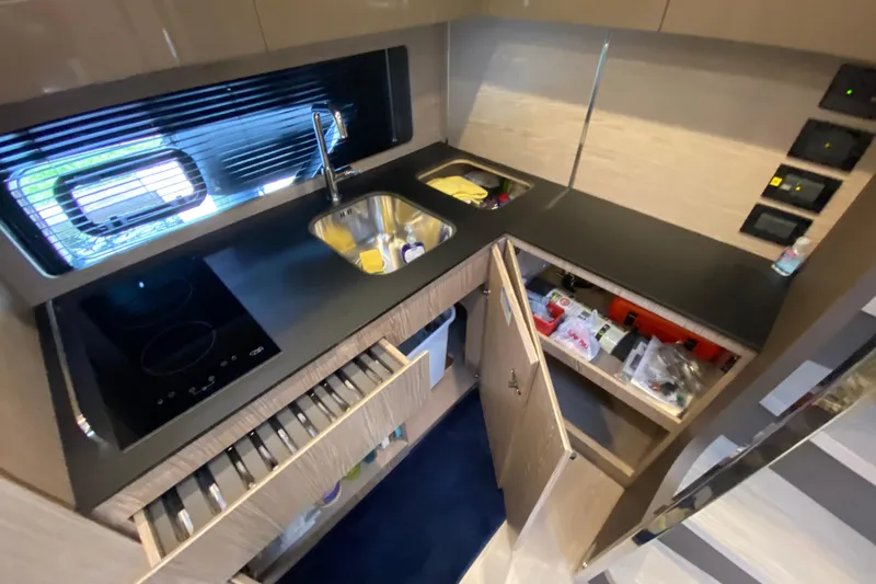 Slide: The Image of Modern kitchen interior of 2021 Azimut Atlantis 45 yacht with sleek design. - 38