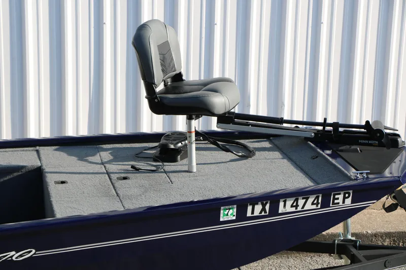 Slide: The Image of 2019 Tracker Pro 170 boat with seating and Minn Kota trolling motor. - 8