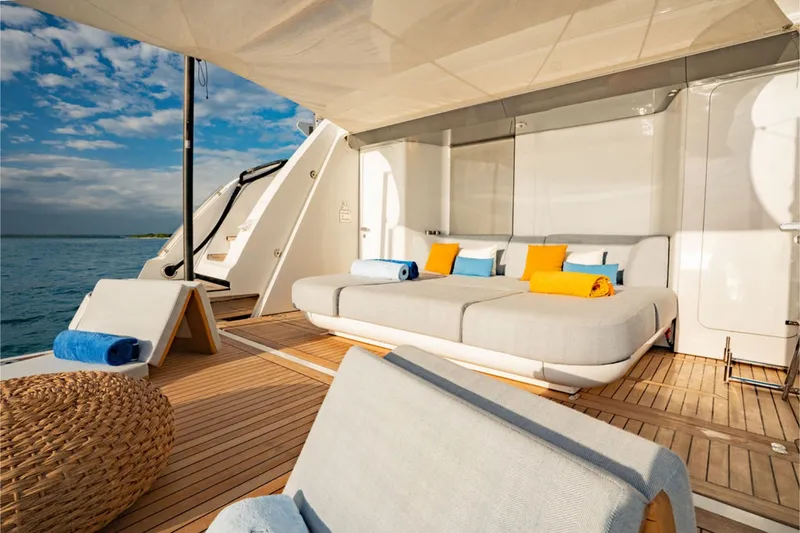 Slide: The Image of Luxurious outdoor area of the 2024 Azimut Grande 36M with loungers and sea view. - 15