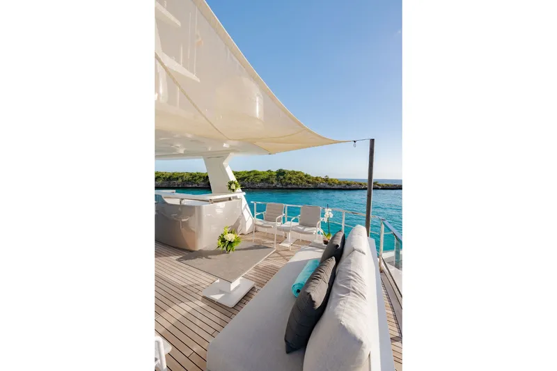 Slide: The Image of Luxurious deck of the Azimut Grande 36M with elegant seating and ocean view. - 5