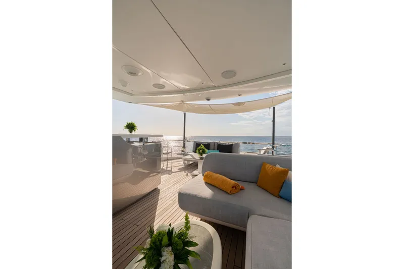 Slide: The Image of Luxurious deck of the 2024 Azimut Grande 36M with elegant seating and ocean view. - 4