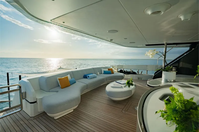 Slide: The Image of Luxurious yacht with elegant lounge, modern furniture, and ocean view at sunset. - 24