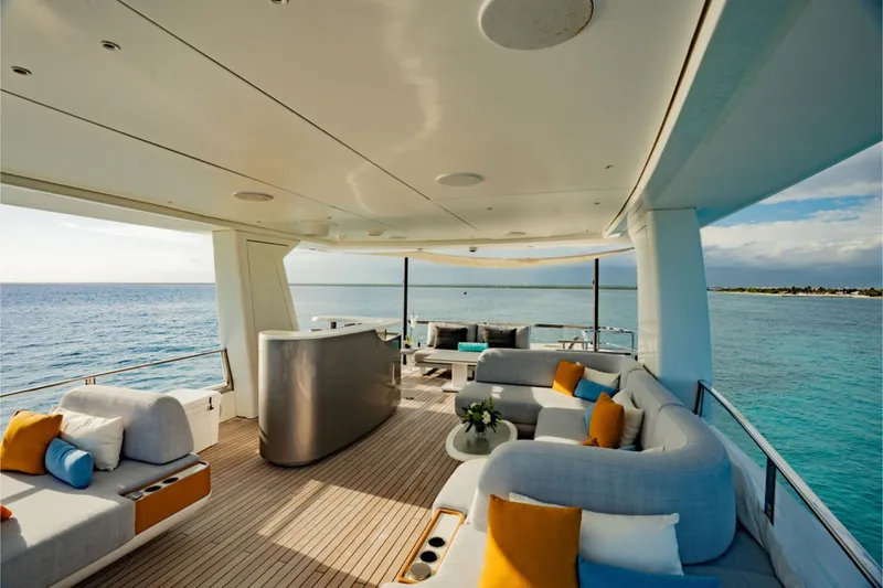 Slide: The Image of Luxurious deck of the Azimut Grande 36M with elegant sofas and ocean view. - 10