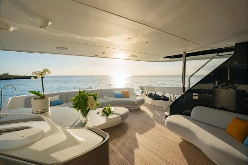 Slide: The Image of The 2024 Azimut Grande 36M features an elegant deck with modern seating and ocean views. - 26