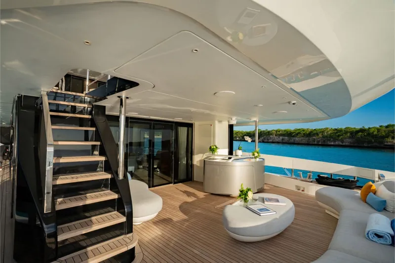 Slide: The Image of Luxurious deck of the 2024 Azimut Grande 36M with elegant seating and a view of the water. - 21