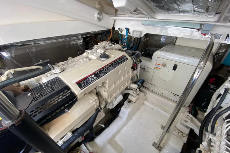 Slide: The Image of Engine room of 2000 Riviera 4000 with Volvo Penta engine and Kohler power system. - 56