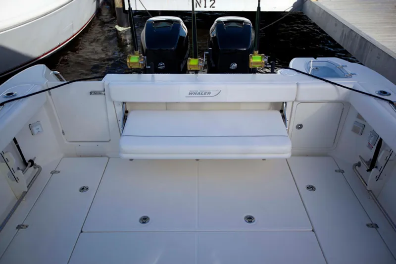 Slide: The Image of Manufacturer Provided Image: 2015 Boston Whaler 315 Conquest boat deck with twin outboard motors. - 18