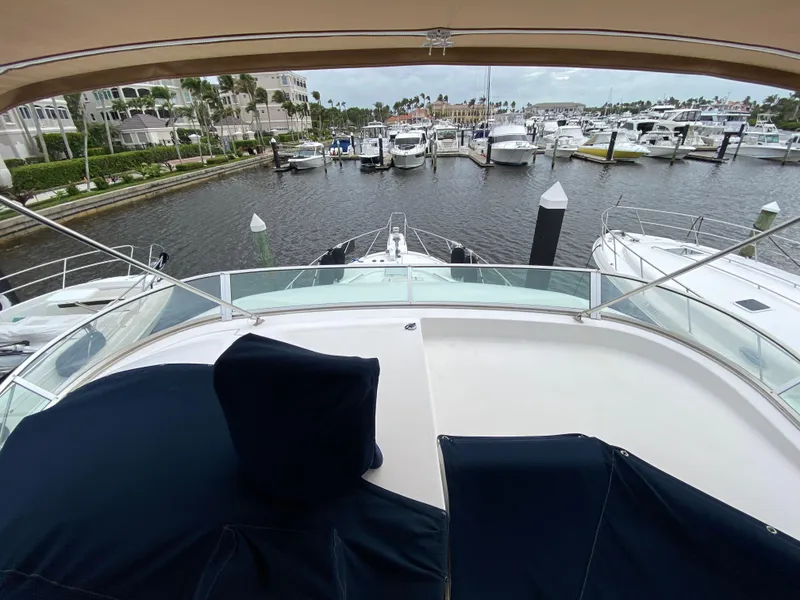 Slide: The Image of View from 2001 Bayliner 3988 yacht overlooking marina with multiple boats docked. - 45