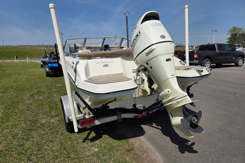 Slide: The Image of 2017 Stingray 191 DC boat with Suzuki outboard motor on trailer. - 4