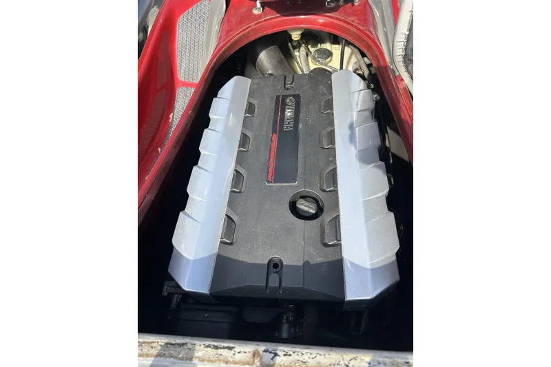 Slide: The Image of 2011 Yamaha WaveRunner FZS engine compartment with visible engine components. - 4