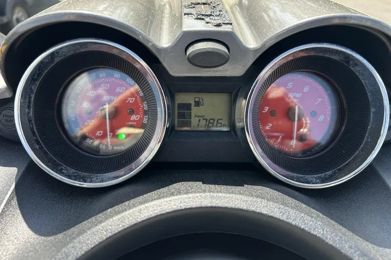 Slide: The Image of Dashboard of a 2011 Yamaha WaveRunner FZS showing speedometer and RPM gauges. - 9