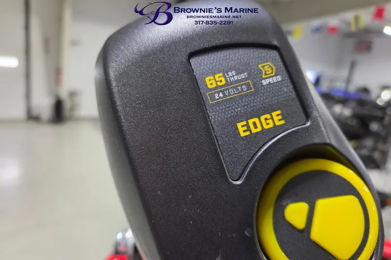 Slide: The Image of Close-up of a 2005 Tracker Pro Team 175 boat motor control, featuring 65 lbs thrust. - 3