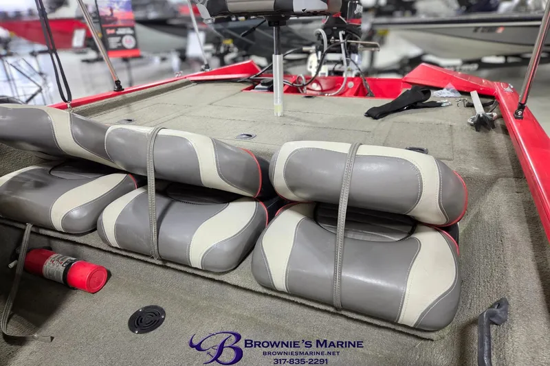 Slide: The Image of 2005 Tracker Pro Team 175 boat interior with gray seats and red accents. - 4