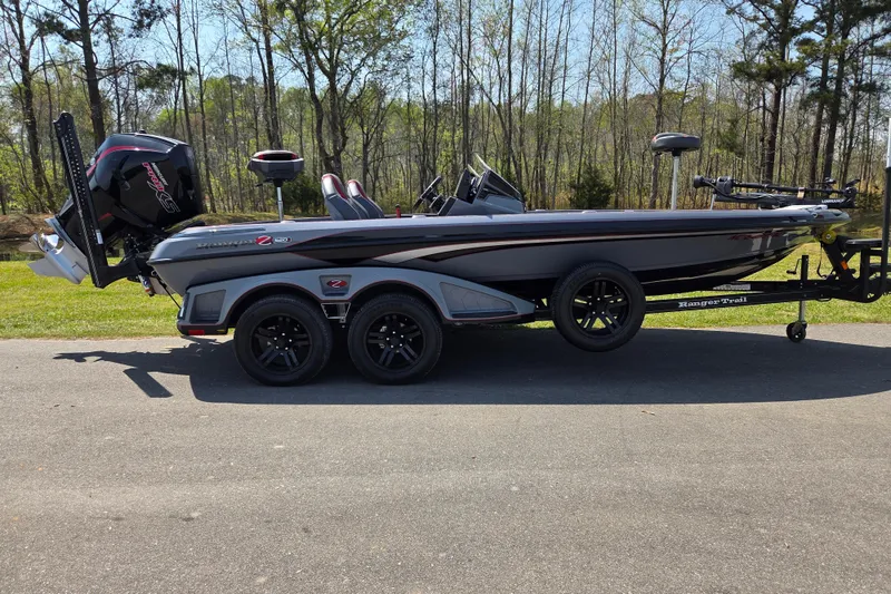 The Image of 2023 Ranger Z520R 55th Anniversary Limited Edition boat on trailer, parked outdoors. - 0