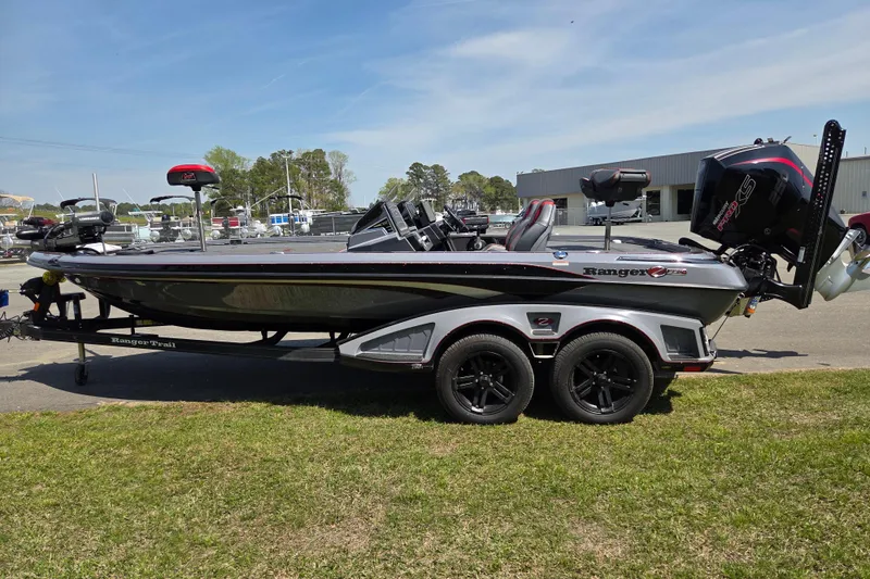 Slide: The Image of 2023 Ranger Z520R 55th Anniversary Limited Edition boat on trailer, parked outdoors. - 6