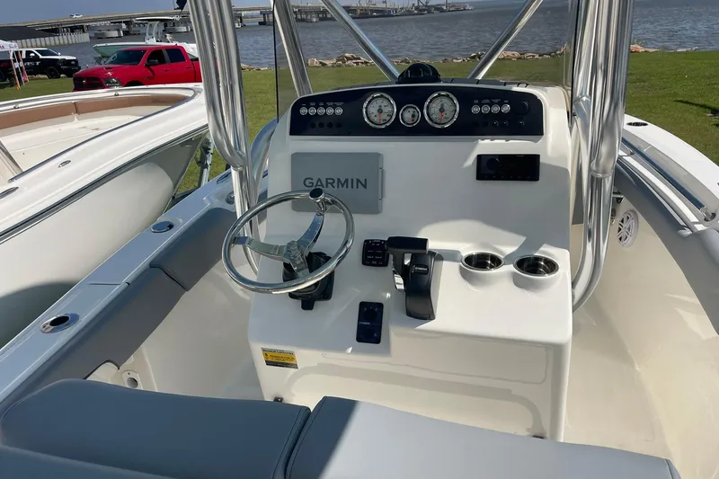 Slide: The Image of Cockpit of 2026 Pioneer 202 Islander boat with Garmin navigation system. - 11
