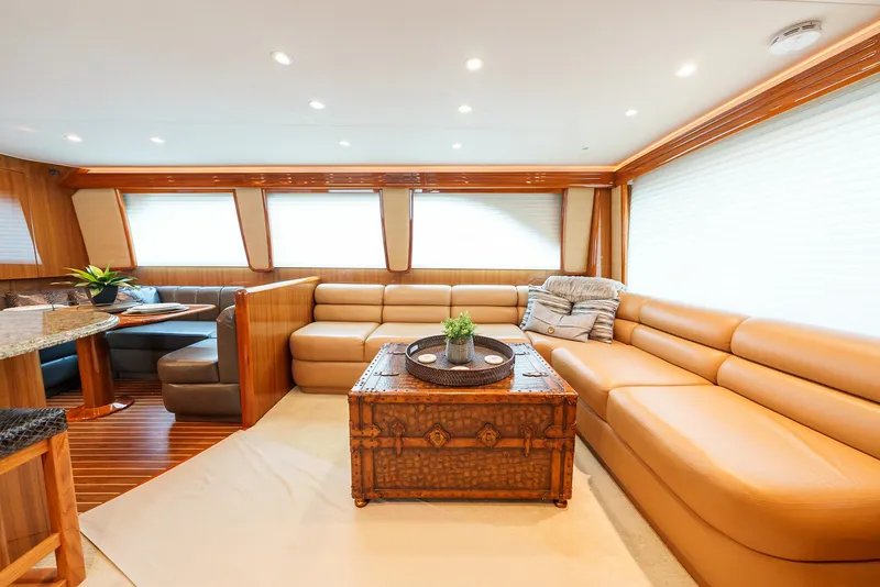 Slide: The Image of Luxurious interior of 2008 Viking 68 Skybridge yacht with leather seating and wooden accents. - 1