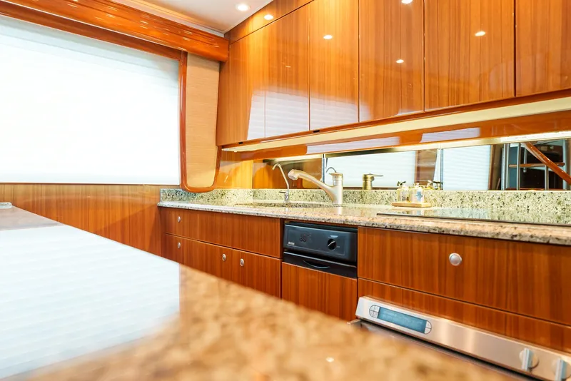 Slide: The Image of Luxurious kitchen interior of 2008 Viking 68 Skybridge yacht with granite countertops. - 14