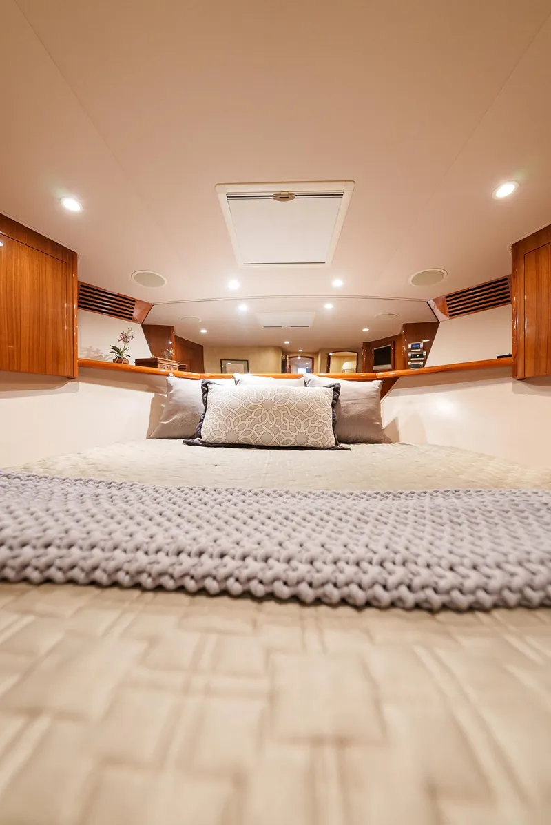 Slide: The Image of Luxurious bedroom interior of 2008 Viking 68 Skybridge yacht with cozy bedding. - 29
