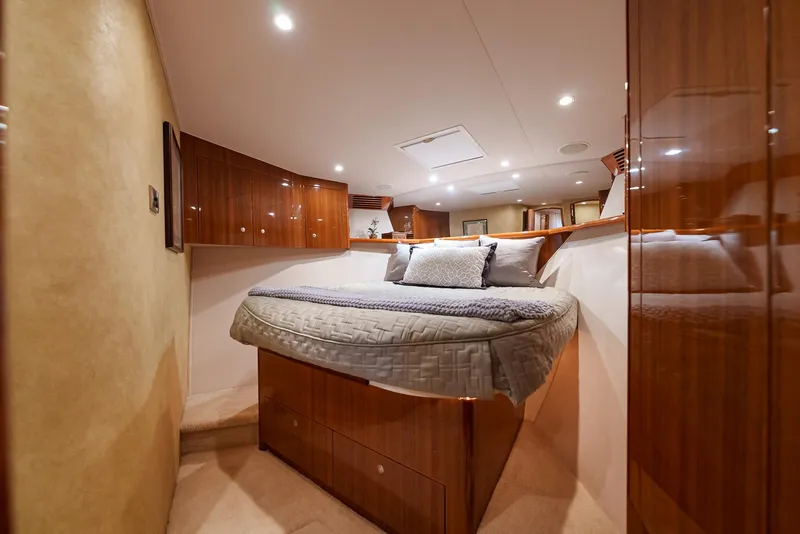 Slide: The Image of Luxurious bedroom interior of 2008 Viking 68 Skybridge yacht with wood finishes. - 30