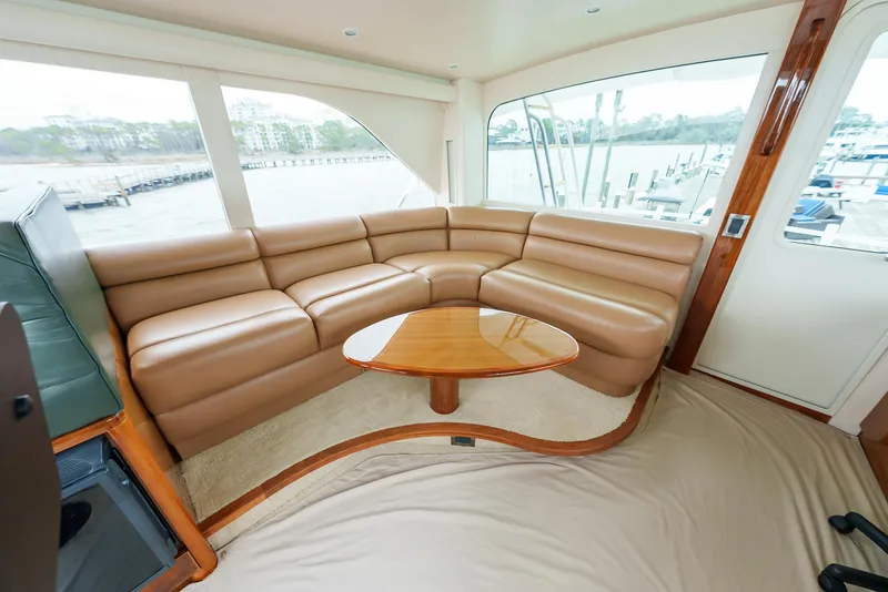 Slide: The Image of Luxurious leather seating area inside a 2008 Viking 68 Skybridge yacht. - 46