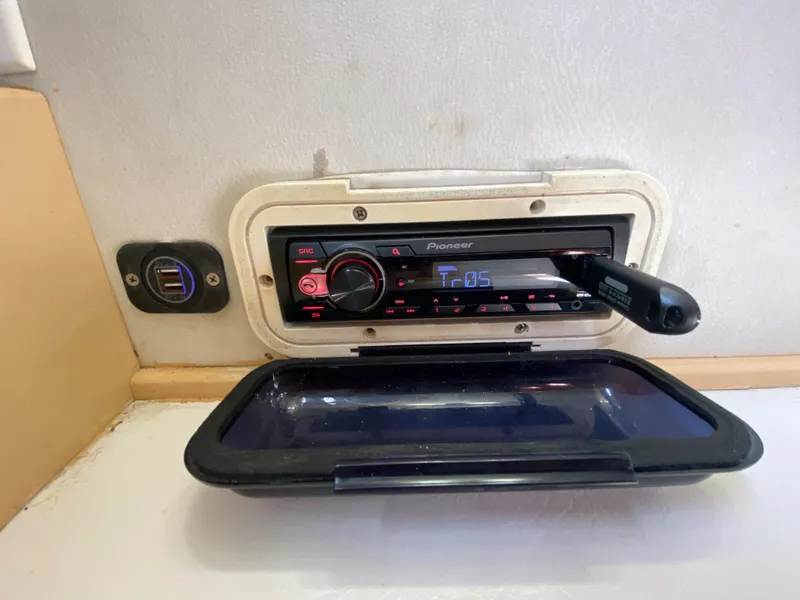 Slide: The Image of Pioneer stereo system in 1997 Stamas 310 Express boat cabin. - 11