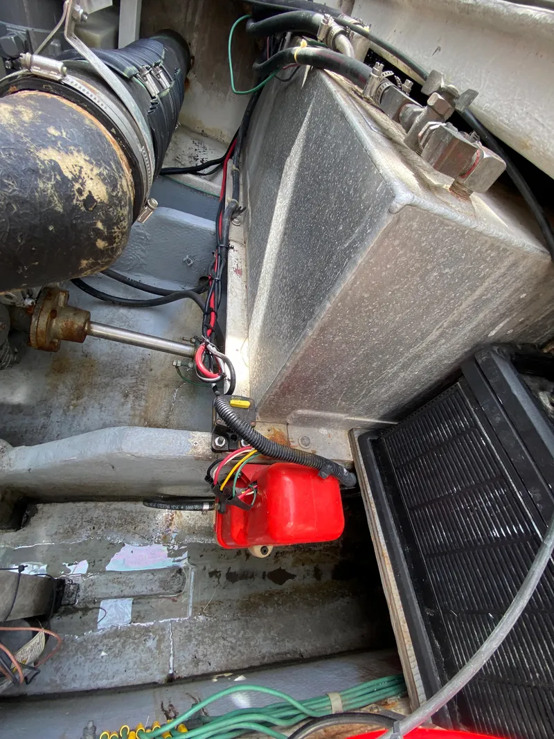 Slide: The Image of 1997 Stamas 310 Express engine compartment with wiring and components. - 26