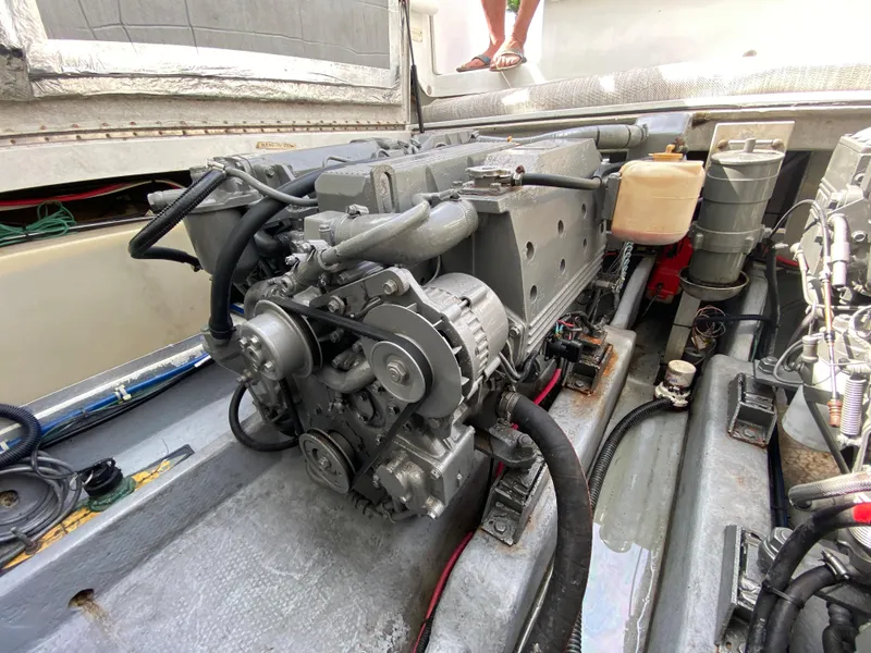 Slide: The Image of 1997 Stamas 310 Express engine compartment with visible engine components. - 28